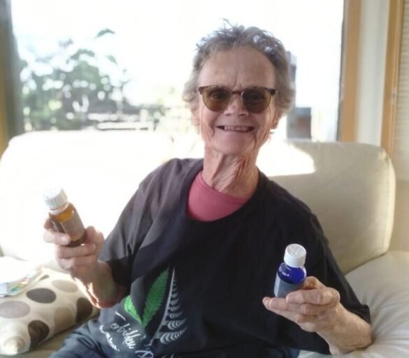 Helen with her hemp treatment bottles